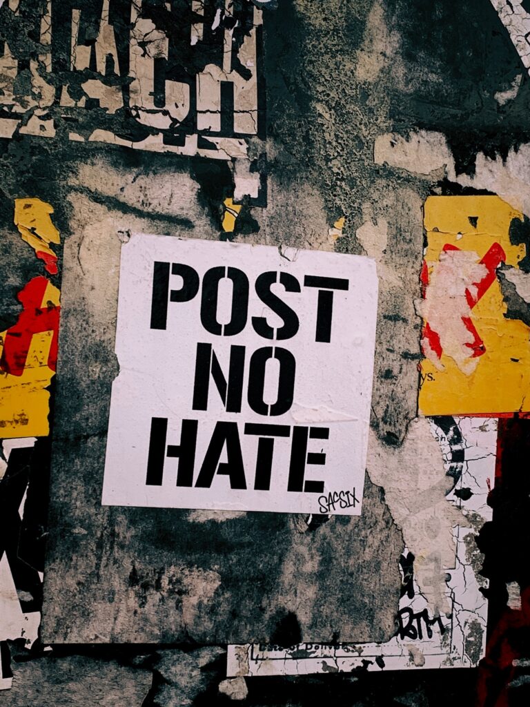 a poster with post no hate